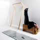Illustration for article titled Exercise Furniture Tones, Tightens and Ties a Room Together
